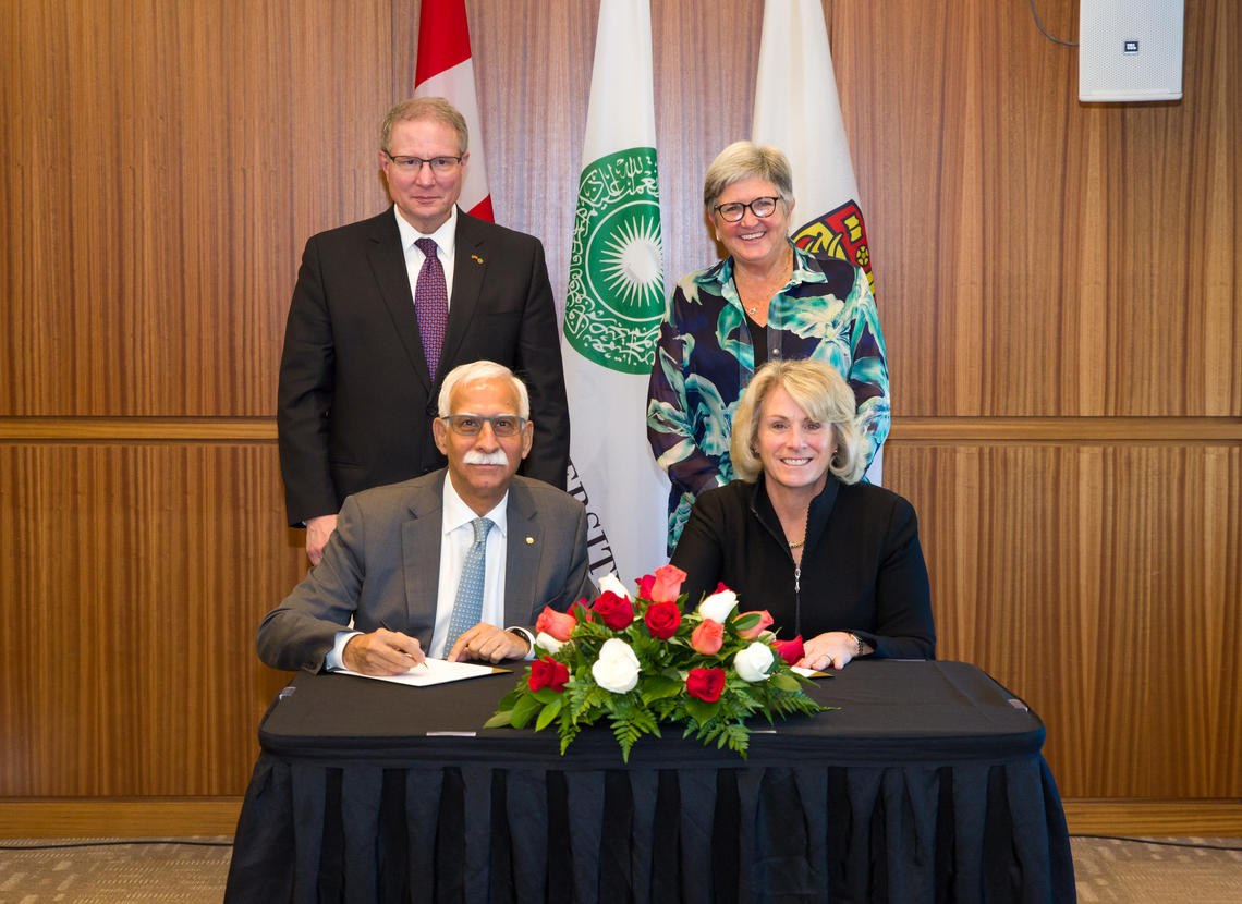 Signing a Memorandum of Understanding on Oct. 17, 2018 between the University of Calgary and the Aga Khan University.