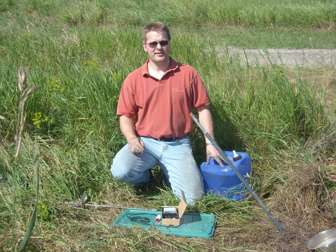Department of Geosciences associate professor Edwin Cey does hydrology field work in September 2017.