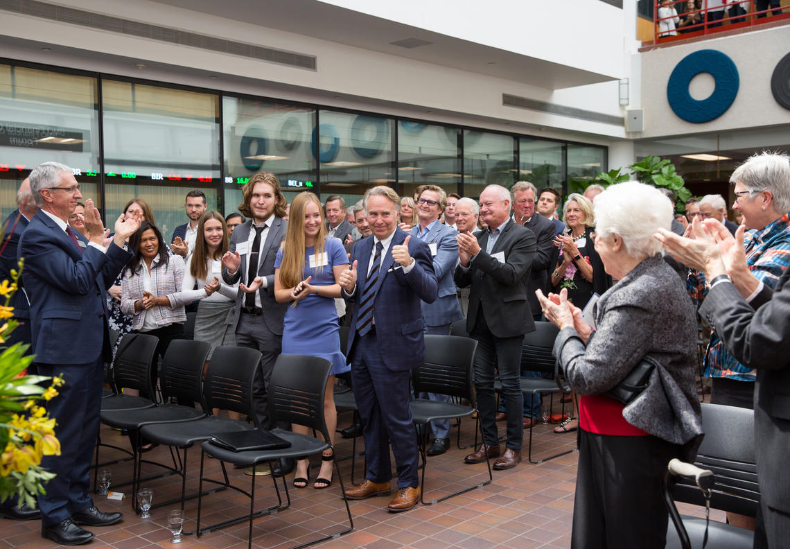An appreciative University of Calgary audience applauds as Ronald P. Mathison's donation is announced on Friday, helping to fund a second building for the Haskayne School of Business.
