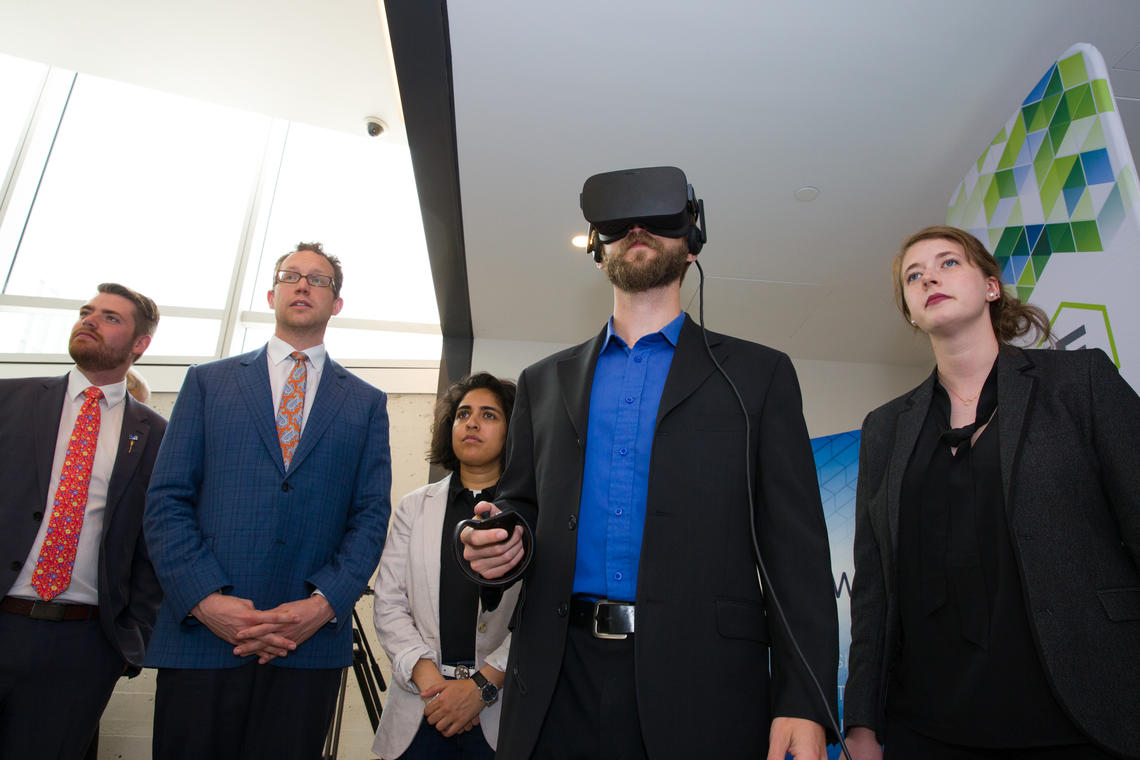 Advanced Education Minister Marlin Schmidt, second from left, takes a technology tour on Thursday as he announces funding for a new course-based master’s degree in software engineering at the Schulich School of Engineering.