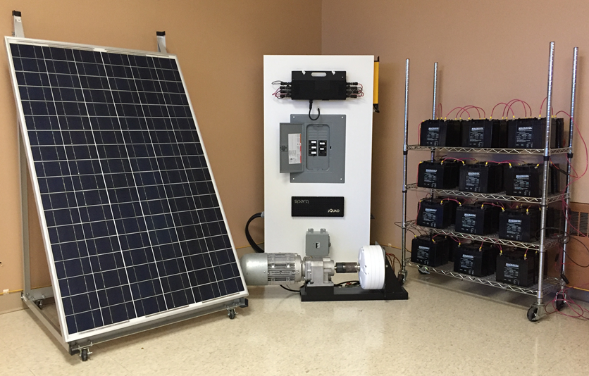 A PV panel, wind simulator, micro-grid, and battery pack; all elements of the hybrid micro-grid for distributed power generation to be built on the University of Calgary's campus. 