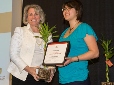 April Jang accepting the Sustainability Award for Student Club Leadership