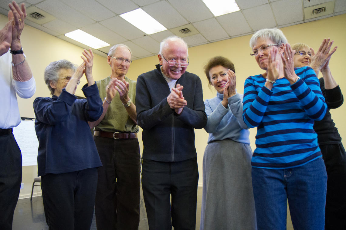 The research study uses weekly dance classes as a therapeutic tool for Parkinson’s patients to improve practical motor skills and provide an avenue for social communication and emotional expression.