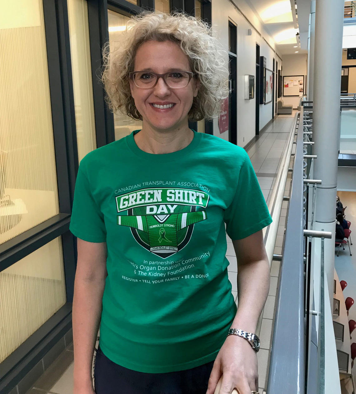UCalgary Nursing dean Sandra Davidson sports a green shirt in support of the #LoganBouletEffect and The Kidney Foundation.