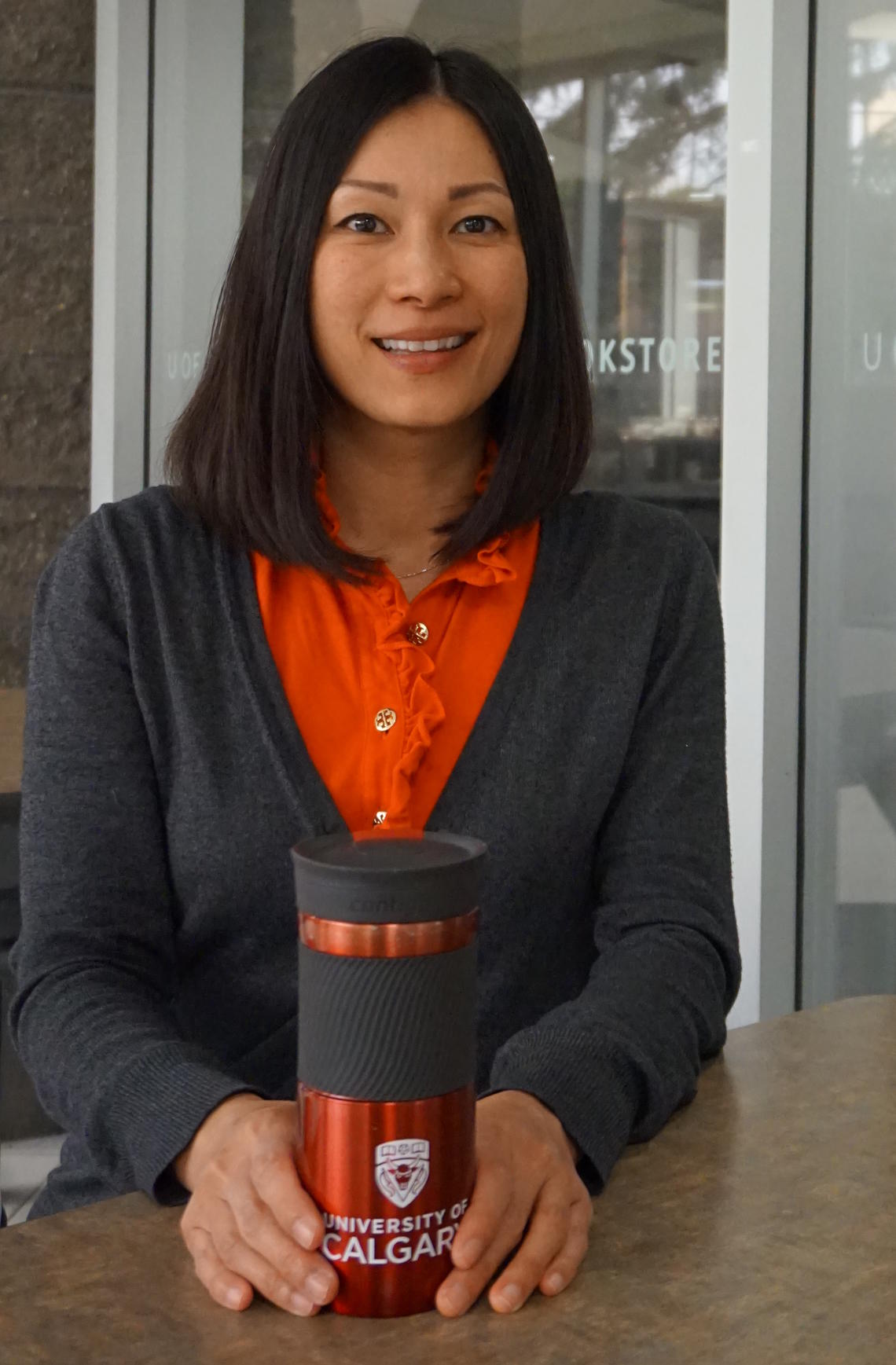 Using the ecofriendly cup she received for presenting at the Women’s Leadership Conference is just one way Gina Ko is doing her part to help the environment.