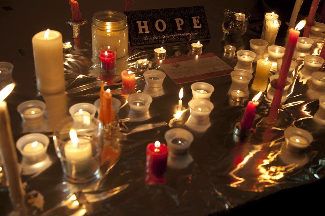 Candles are seen in front of a picture of bullying victim Amanda Todd during a memorial for her in Surrey, B.C., Oct. 19, 2012. Todd is one of a rapidly increasing number of Canadian teens who have taken their own lives. 