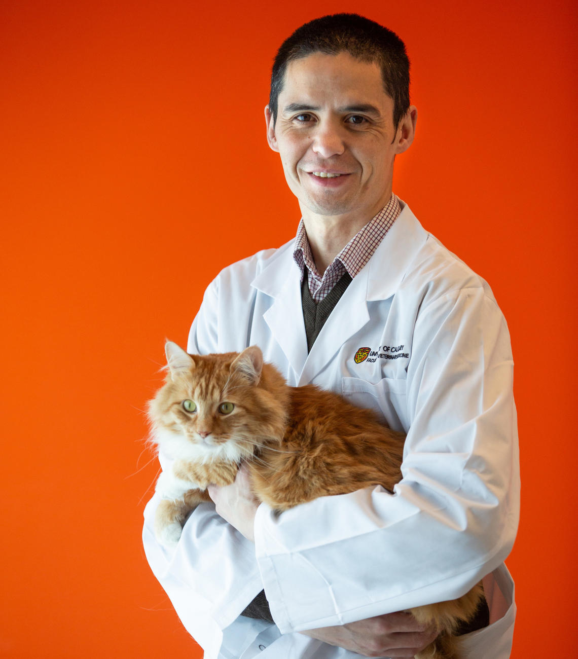 Researcher Daniel Pang and cat