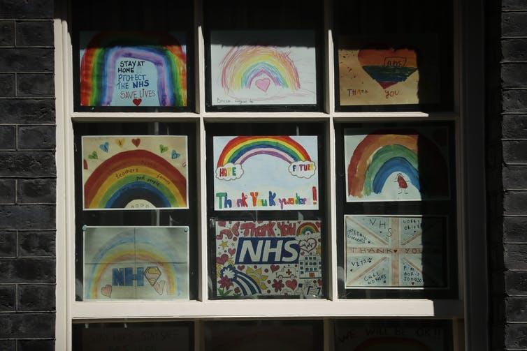 Art from children thanking the National Health Service are displayed in a window at 10 Downing Street in London, May 6, 2020