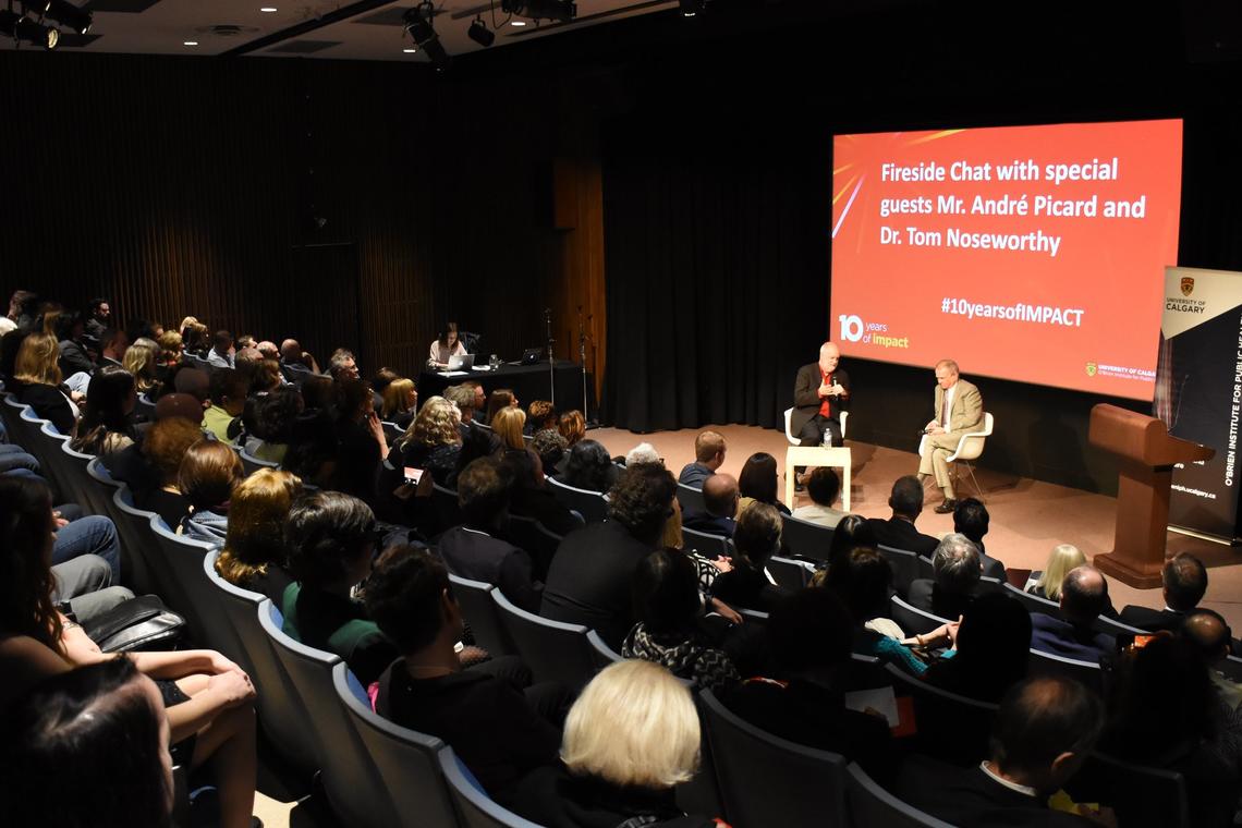 Attendees at the O’Brien Institute event, A new Decade in Public Health, listen to a fireside chat with special guests André Picard and Dr. Tom Noseworthy, MD, at the Glenbow on March 6, 2020.  