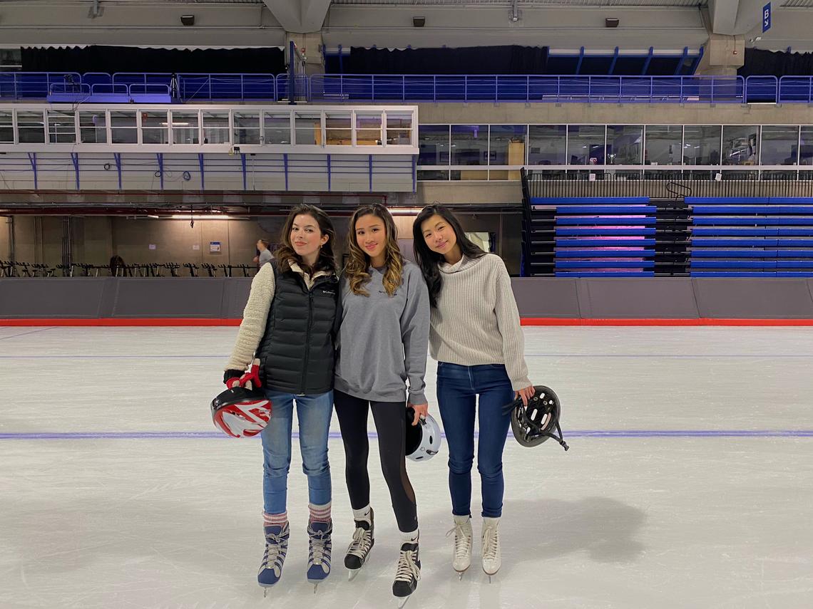 Law students Ana Cherniak-Kennedy, Aisha Tung and Nesta Chan at the Olympic Oval