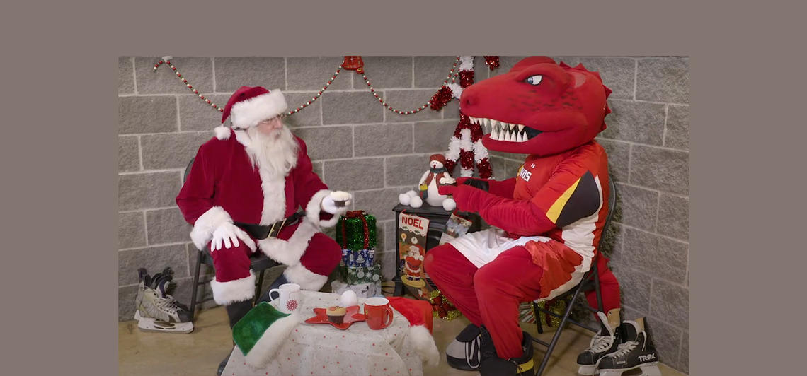 Santa and Rex having holiday treats