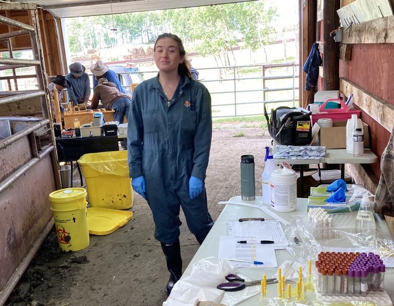 Master’s student Abby Hodder with a variety of study sampling materials at W.A. Ranches.