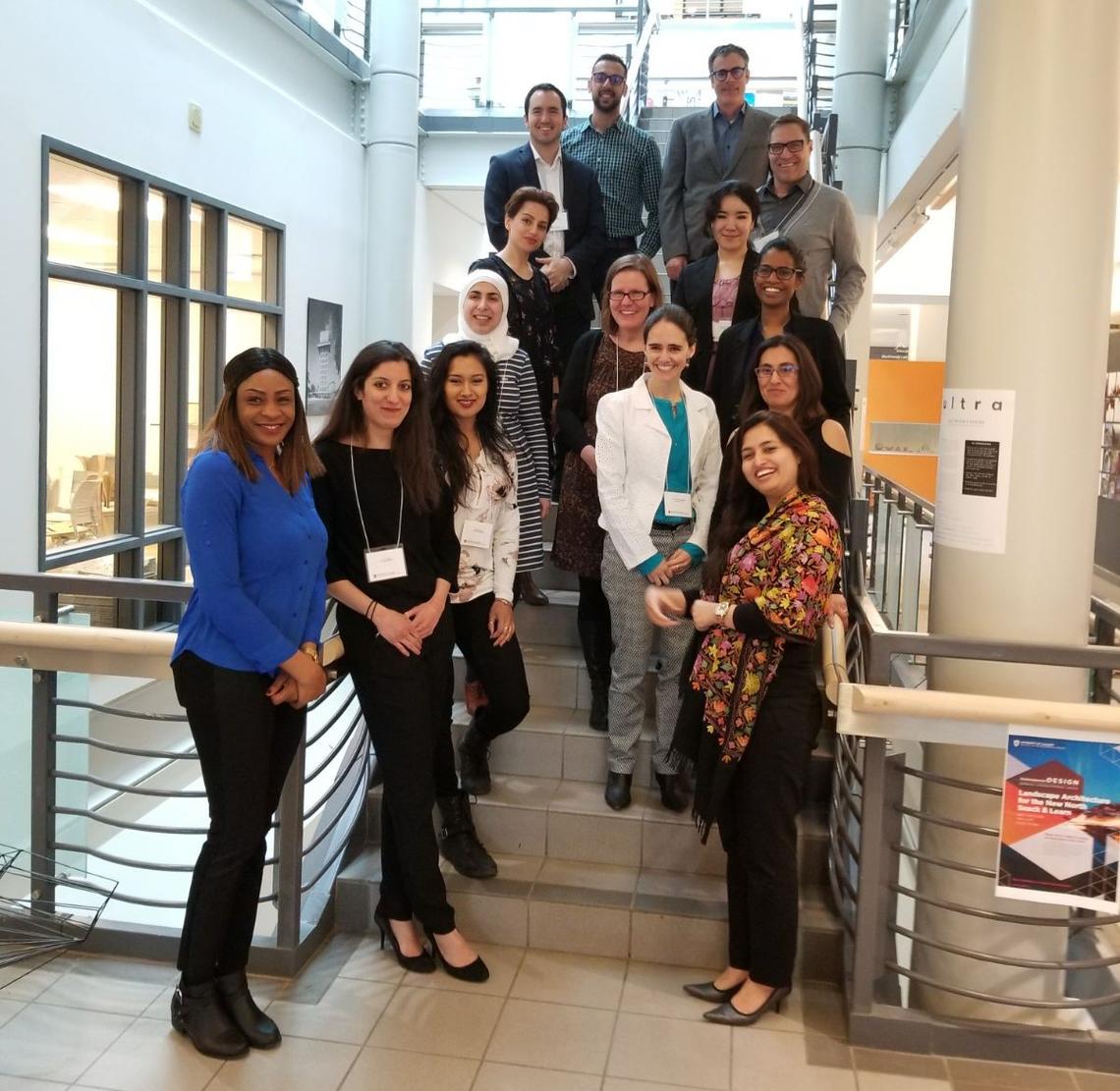 Felix Dalla Vecchia, centre, with grad students and faculty at a research conference in 2018.