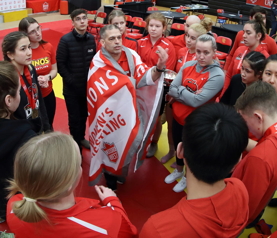 Dinos wrestling coach Mitch Ostberg