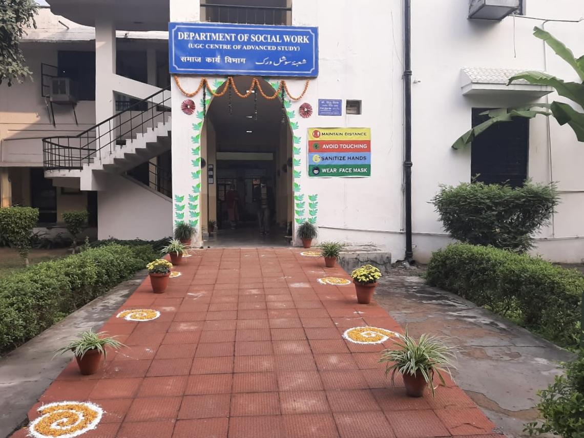 A path leads to the entrance of the School of Social Work, Jamia Millia Islamia University