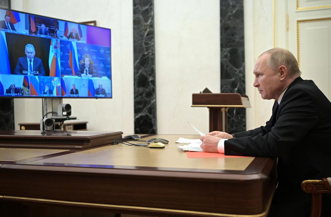 Russian President Vladimir Putin chairs a Security Council meeting in Moscow, Russia, on Jan. 21, 2022. 