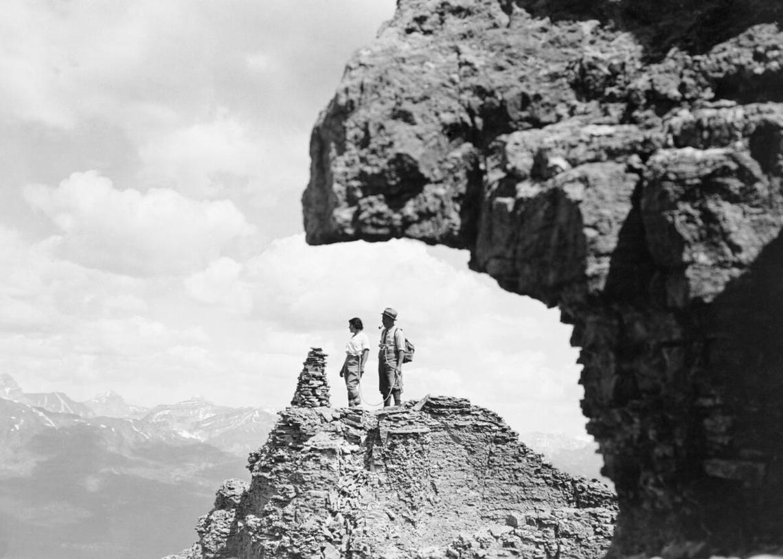 Joan Oliver and guide, Chris Hasler on summit of Needle Peak, Lake Louise area, Alberta