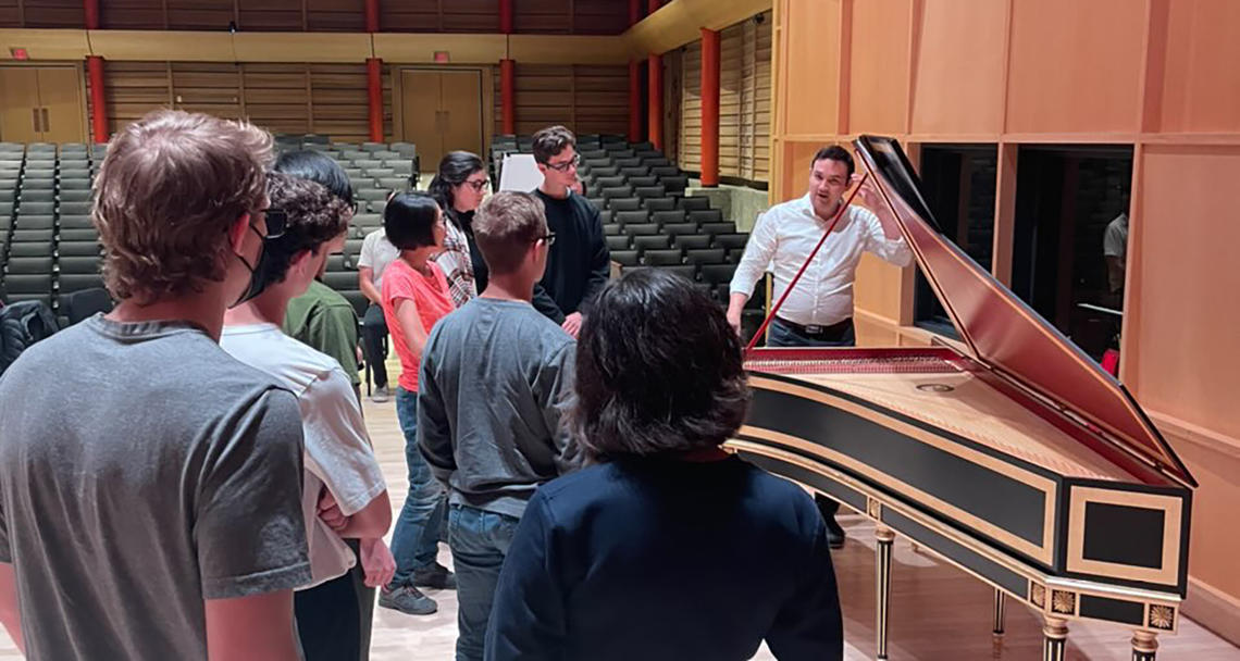 Justin Luchinski demos the harpsichord to students in the piano studio class, Sep. 2022