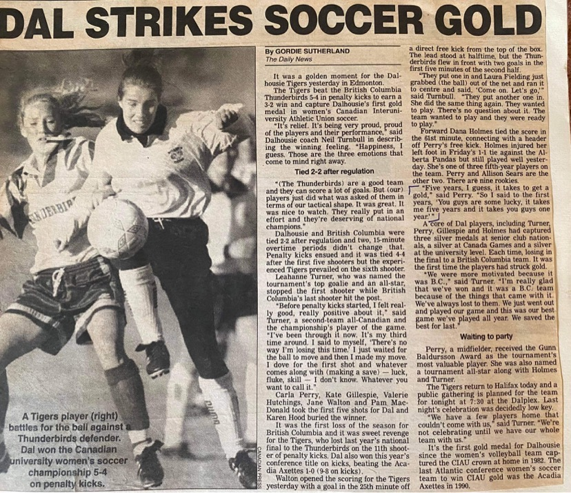 News clipping that reads Dal Strikes Soccer Gold