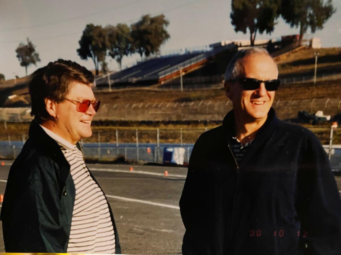 Two men at a race track