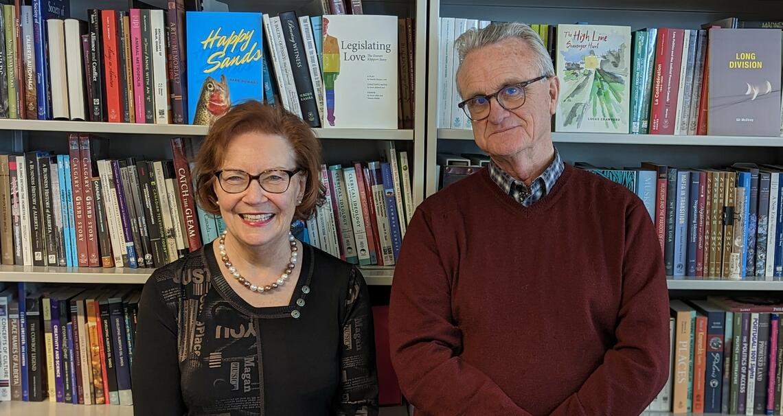 Aritha Van Herk and Brian Scrivener in the University of Calgary Press office