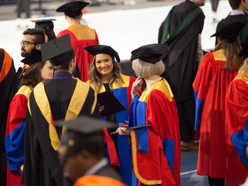 Students celebrate graduation at the 2019 fall convocation ceremony.