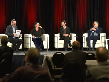 A panel of experts on climate change speak at the One Health Research Symposium.