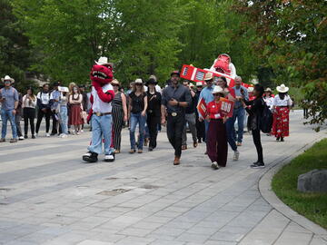 The float being revealed to the campus community at the President's Stampede BBQ.