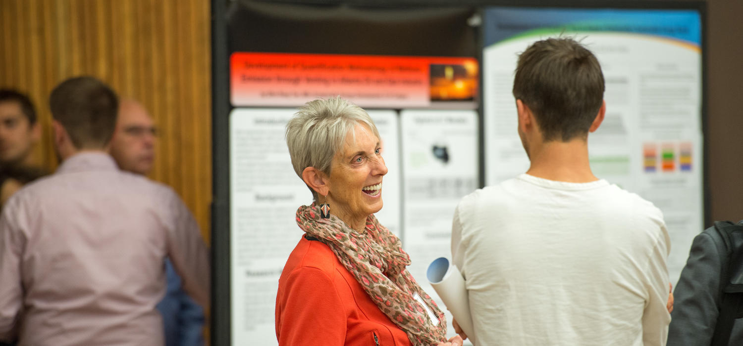 Irene Herremans teaches the capstone research course and supervises students in the Master of Sustainable Energy Development program. Here, she engages with attendees at the 2018 Sustainable Energy Development Student Research Showcase.
