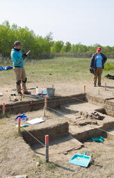 Students from Siksika Nation Outreach School take part in an archaeological excavation at Cluny Fortified Village, located near the Blackfoot Crossing Historical Park and Interpretive Centre. Photo by Riley Brandt, University of Calgary