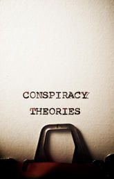 Image of Conspiracy Theory phrase on typewriter