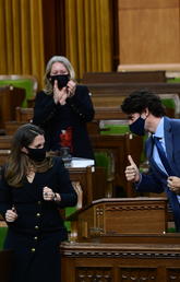 Prime Minister Justin Trudeau gives Finance Minister Chrystia Freeland the thumbs up after she delivered the federal budget in the House of Commons.