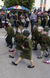 Children in uniforms marching