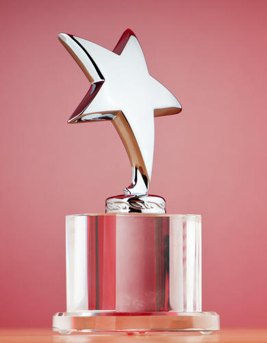 Stock image of an award with a star on top