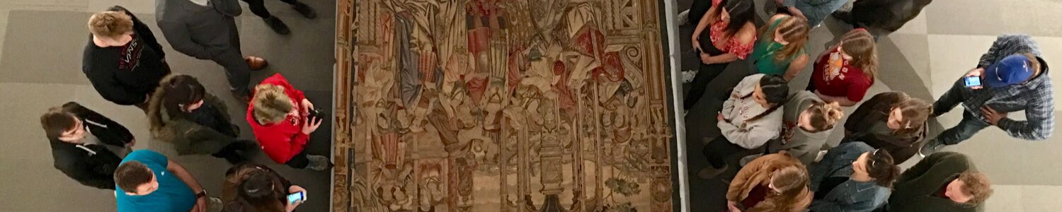 Students viewing a Belgian tapestry in the collection of Nickle Galleries, Photo John Hails