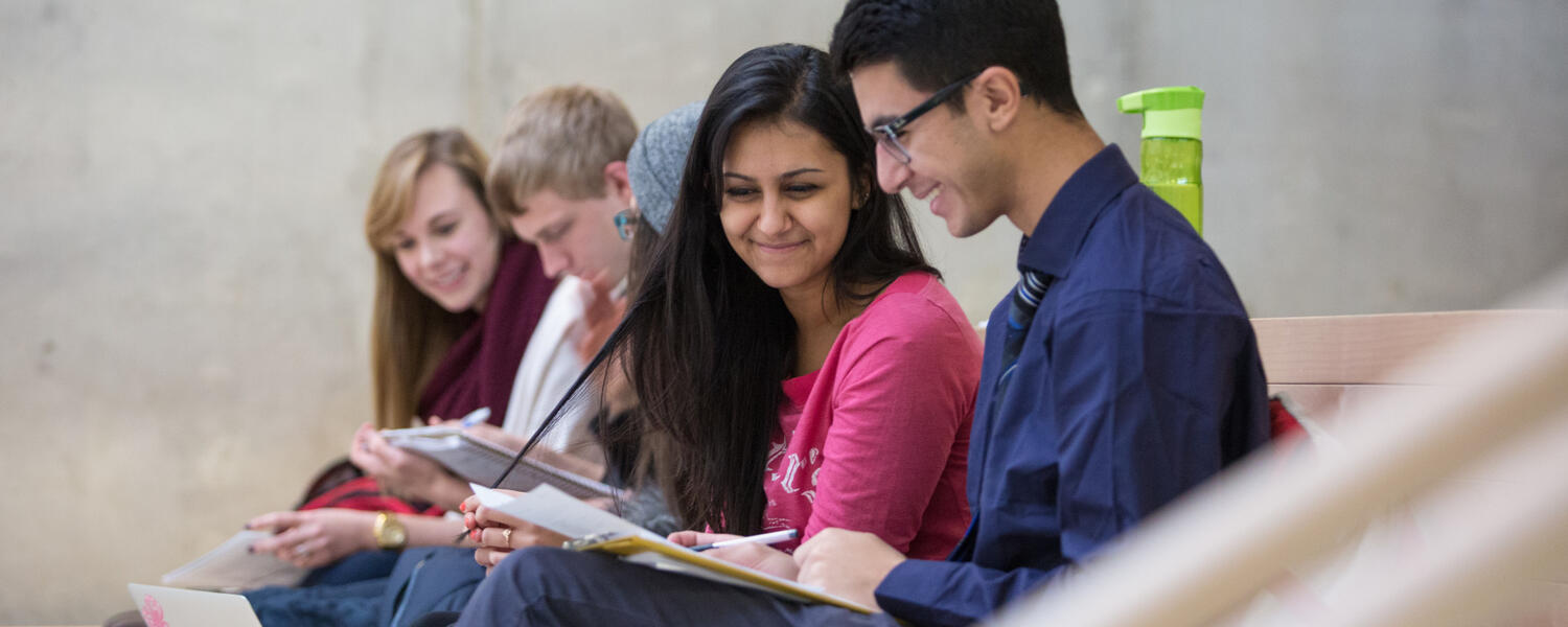 Students studying on the stairs