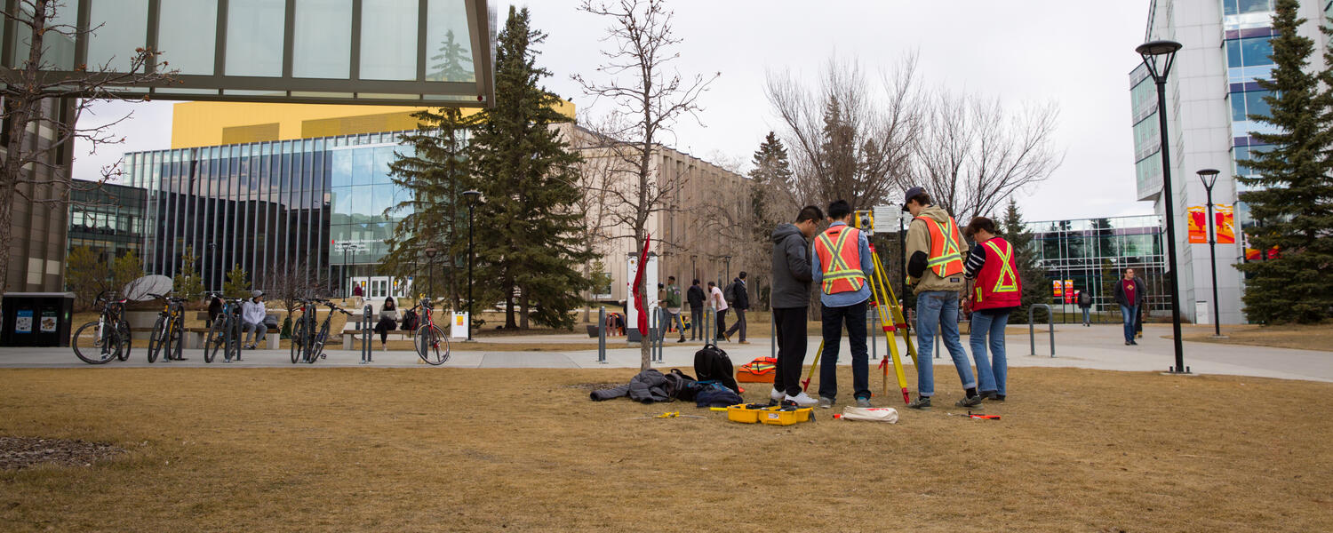 Individuals surveying for the MacKimmie library