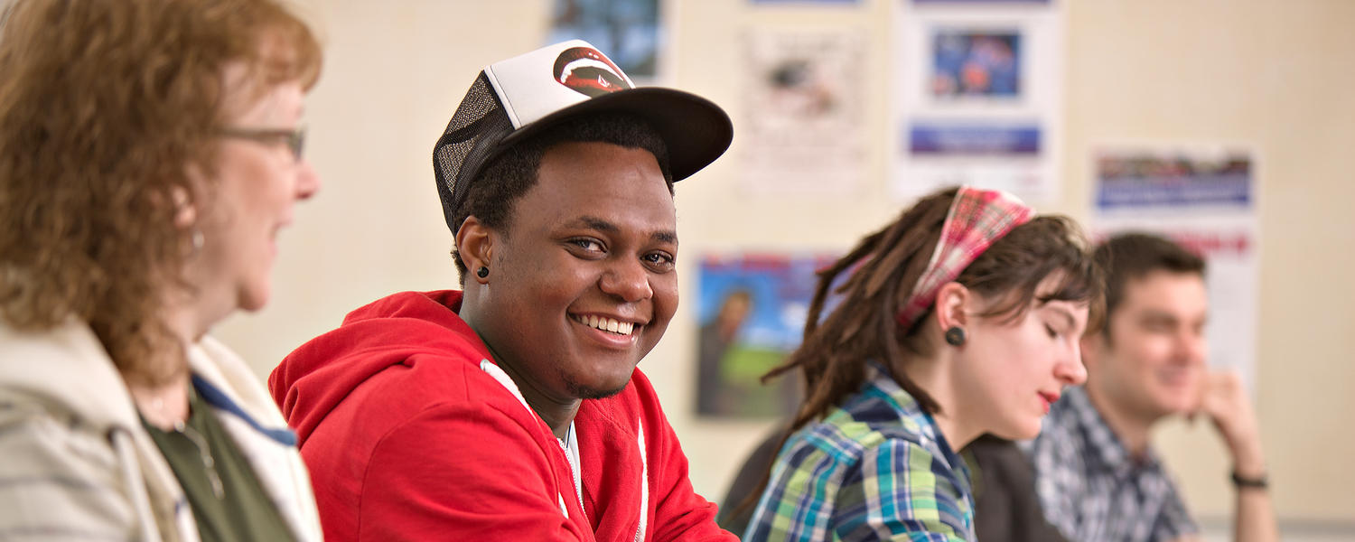 Students smile while in class at Red Deer College