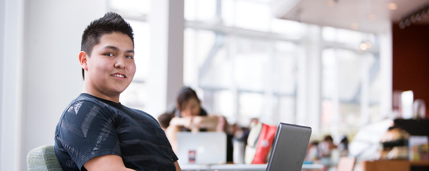 UCalgary student on laptop