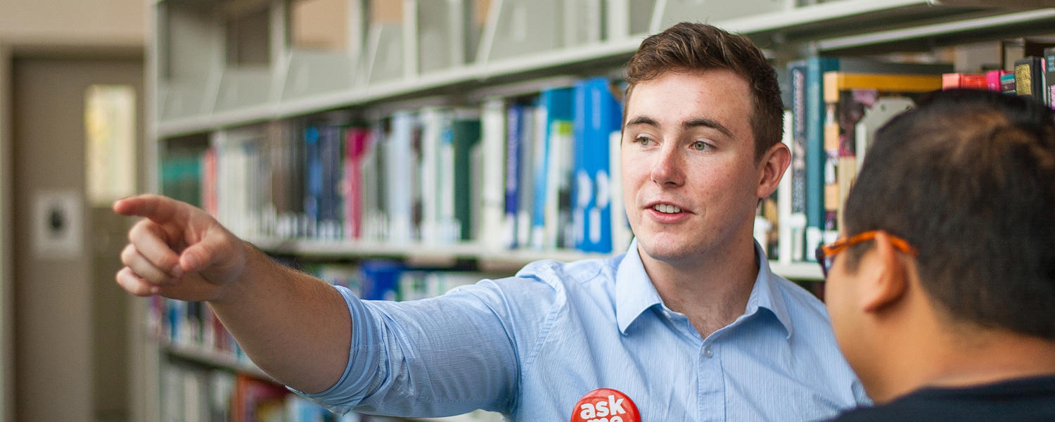 UCalgary student pointing