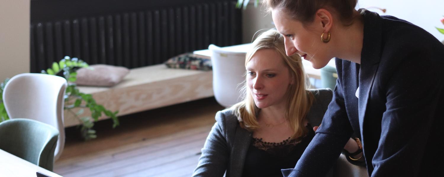 Two employees working