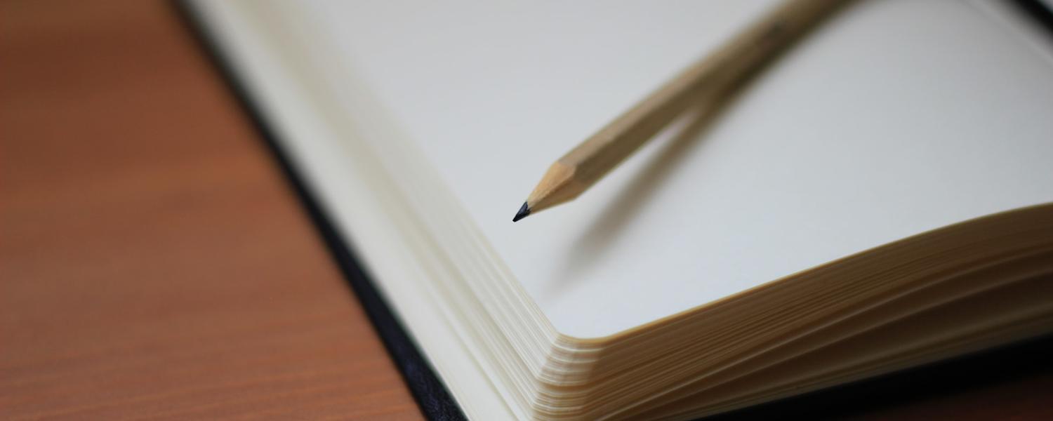 Notebook and pencil