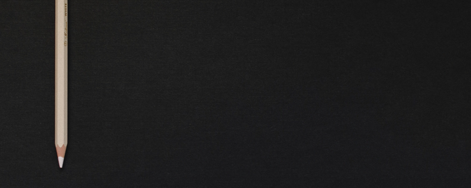 White pencil on black background