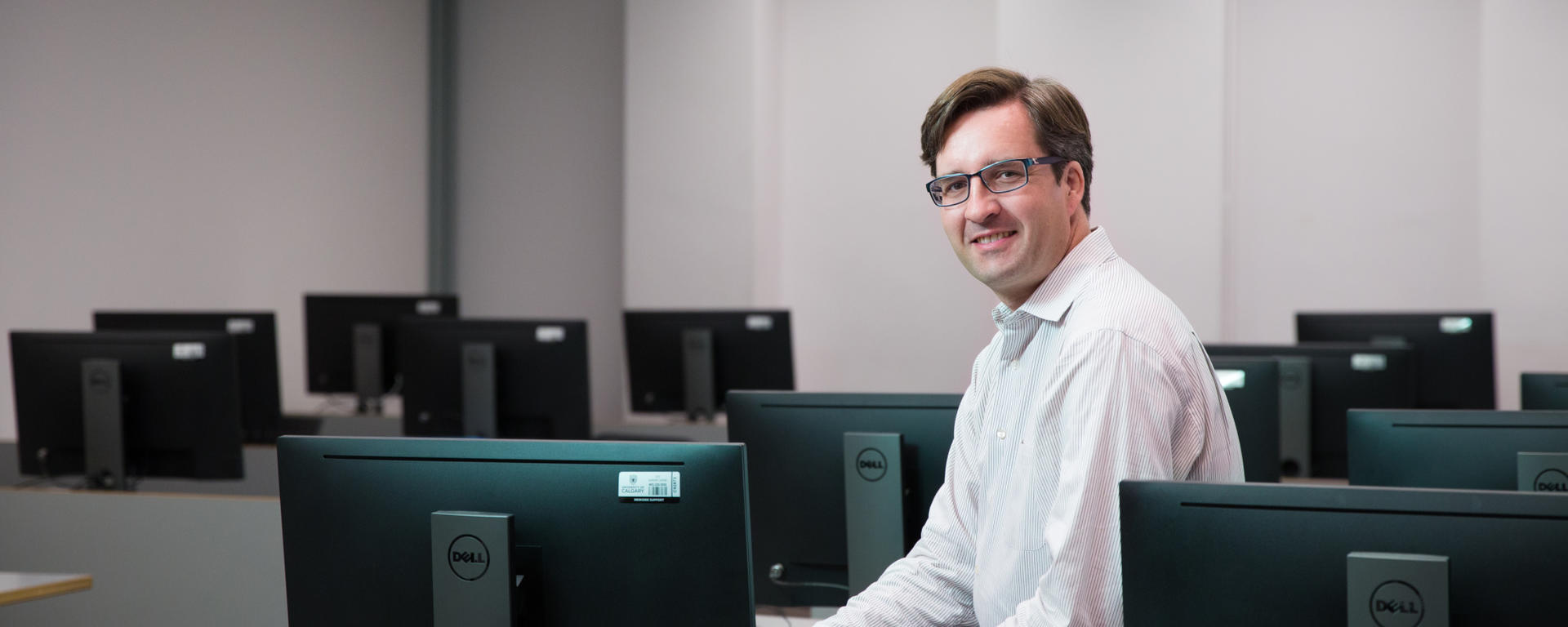 Associate Professor, Department of Economics, Alex Whalley using the research computing cluster for his work at the University of Calgary