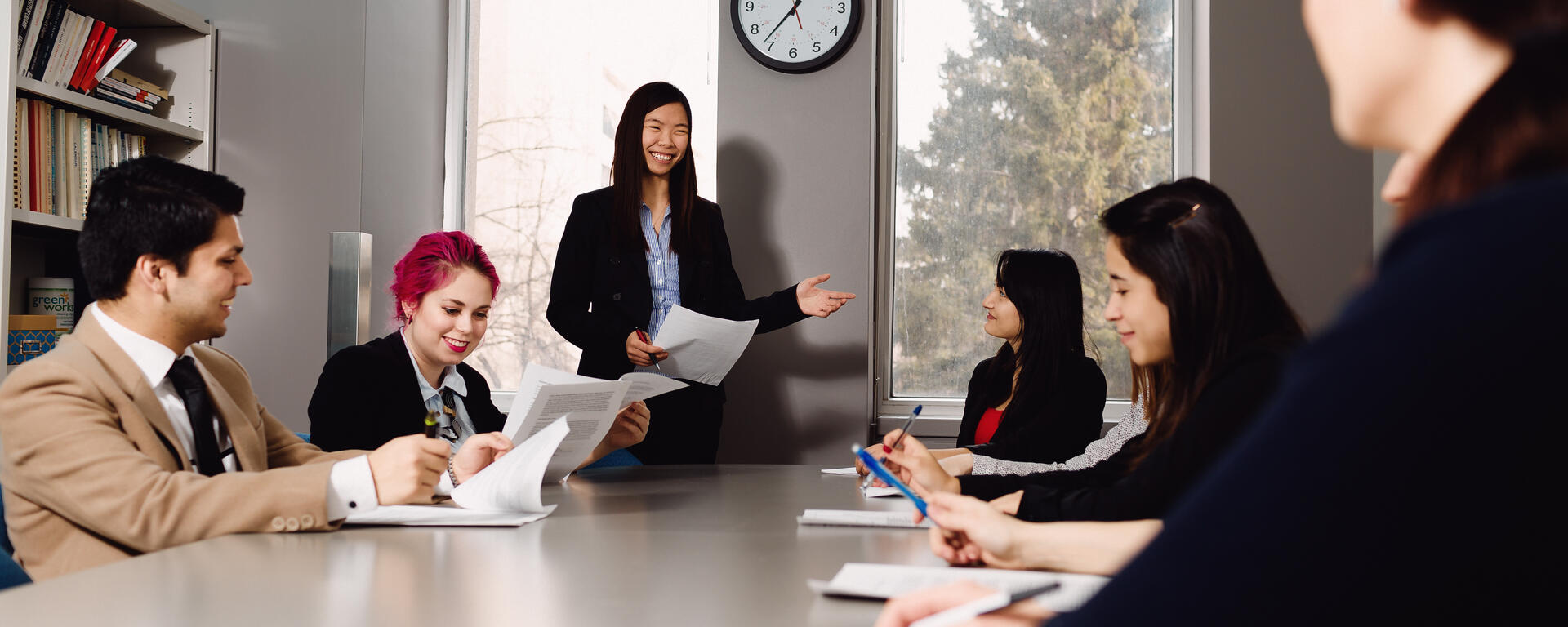 Employers and students meet in a boardroom