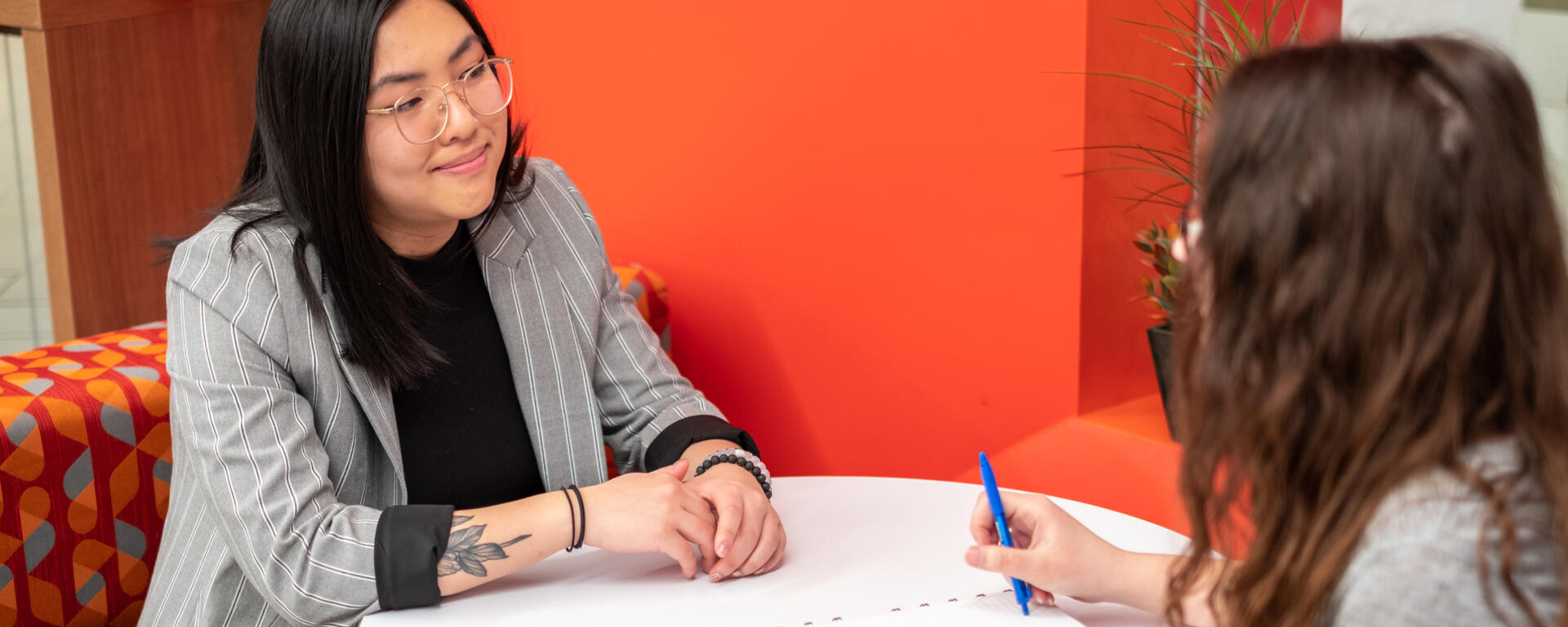 Students chatting in the Hunter Hub