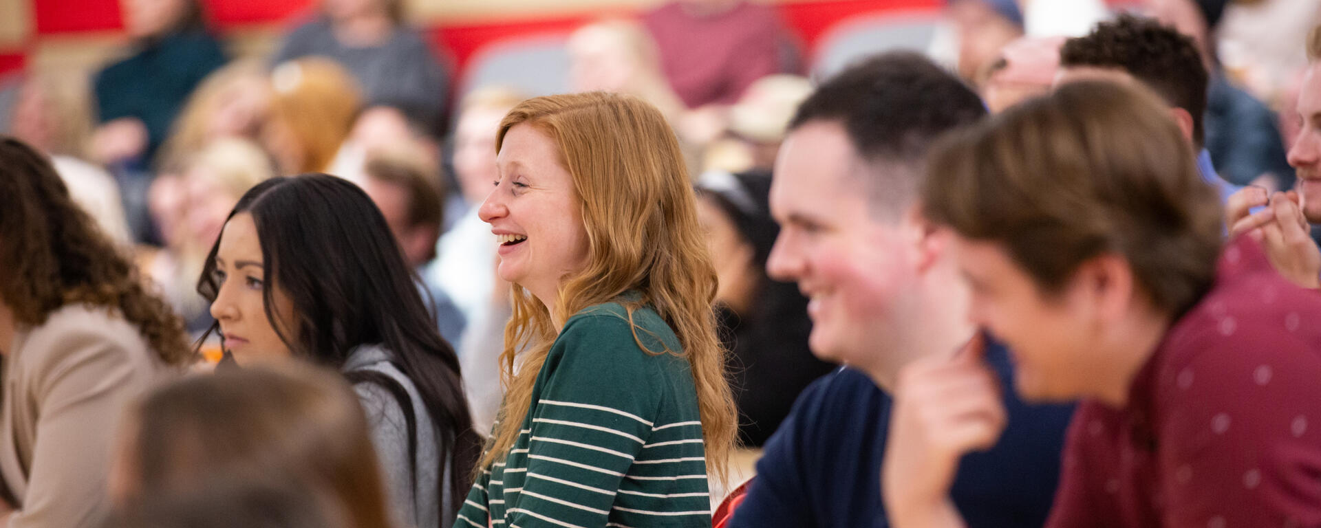 Engaged students in a crowd. The Right Honourable Jean Chrétien, former Prime Minister, visits the University of Calgary to speak to students from the Faculty of Law, The School of Public Policy, and the Department of Political Science at a fireside chat on Thursday, April 6, 2023.