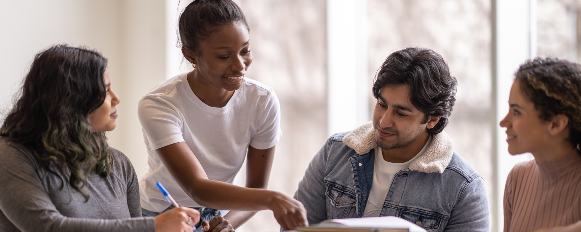 Univesrity students helping each other