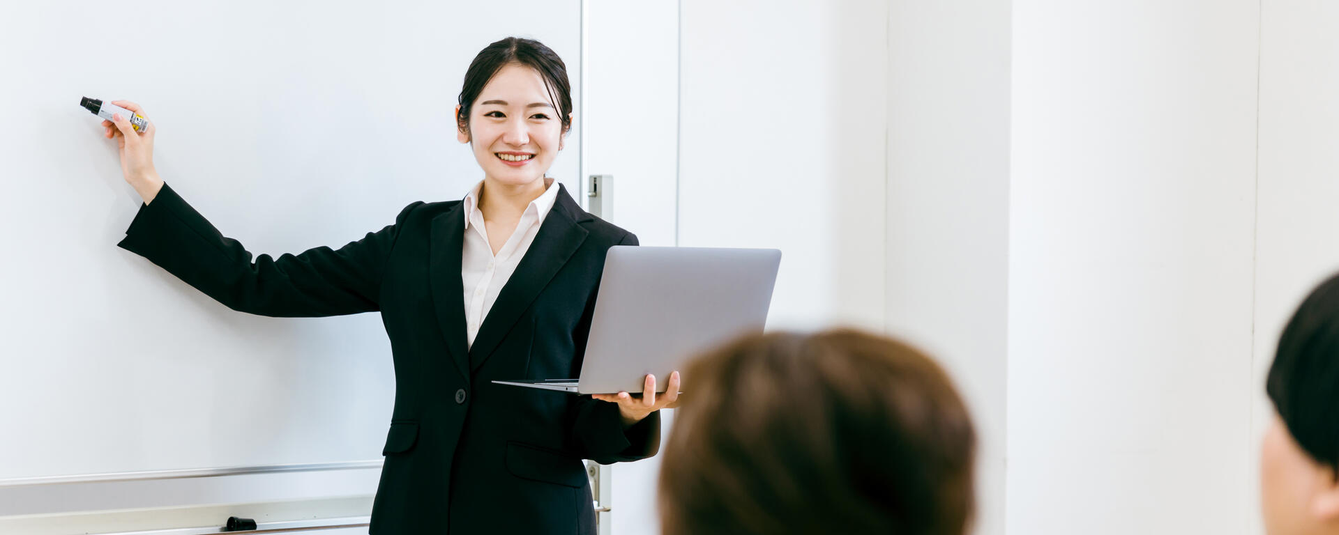image of a teacher teaching a class