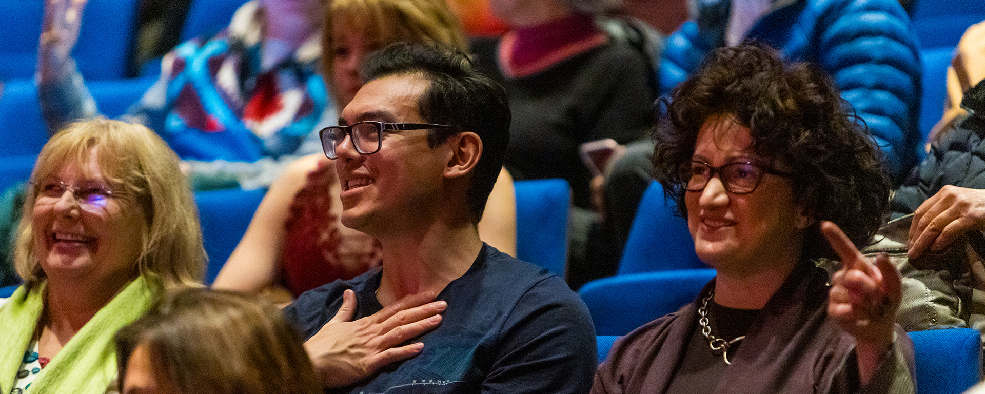 Audience members react to the writer